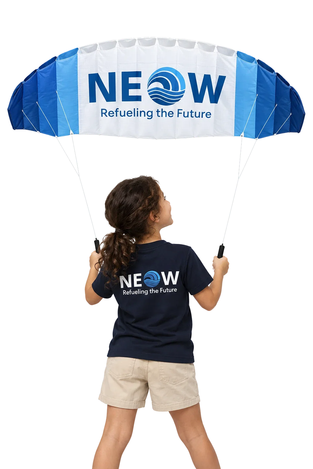 Back view on the model, girl flying the white and blue NEOW power kite in the navy NEOW kids t-shirt